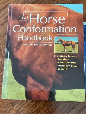 The Horse Conformation Handbook by Heather Smith Thomas - hard cover